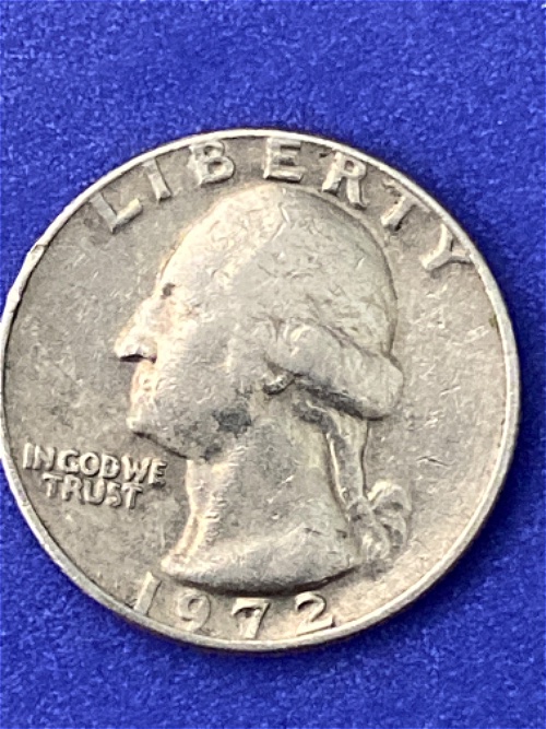1972-No-Mint-Mark-Quarter-Seems-To-Be-Struck-Over-Another-Coin?